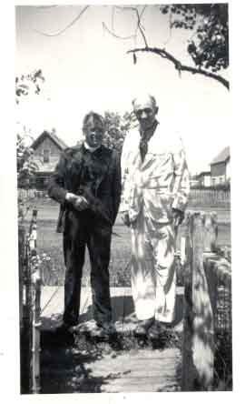 Father Athol Murray with a friend