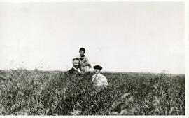 Dr. Shaw With Others In A Field Near Biggar, SK