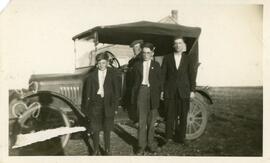 John, Walter, and Gordon Holst With Herb Fritz in Biggar, Saskatchewan
