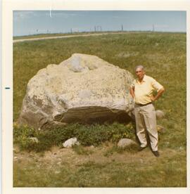 Jack Mooney With A Large White Rock