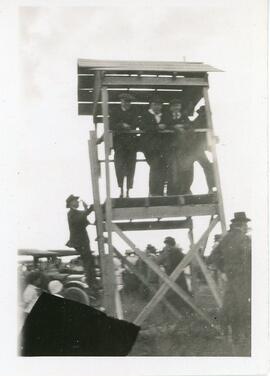 Men On A Wooden Platform in Biggar, Saskatchewan