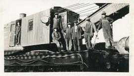 A Group of Men on A CN Crane Car in Biggar, Saskatchewan