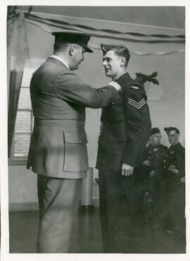 Tom Driscoll Receiving A Medal