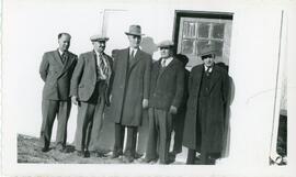 Five Men In Front Of A Building in Biggar, Saskatchewan