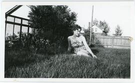Evelyn Sitting On Grass
