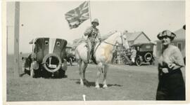 Man In Uniform On A White Horse