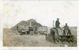 Stanley Sharp and Stanley Boyde Threshing Grain
