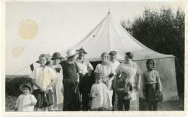 Family In Front Of Tent