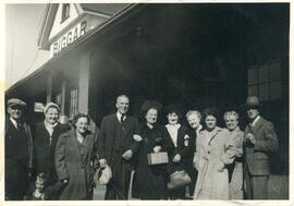 A Group of People in Front of The Canadian National Train Station in Biggar, Saskatchewan