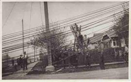Work crew repairing overhead streetcar power lines