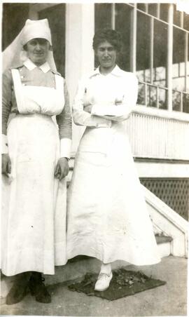 Two nurses standing together