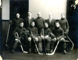 Hockey team photo - sweaters marked "PMA"