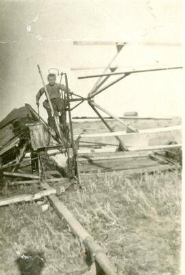 Sam Copithorn with old swather