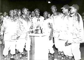 1953 Indian Head Rockets gathered around their trophy