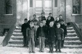 Group of young boys on elementary school steps