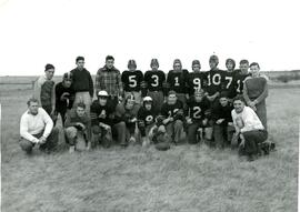 Posed photo of high school football team
