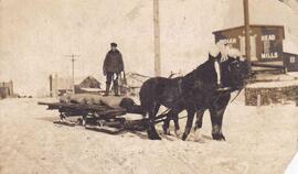 Man on a horse drawn sled post card
