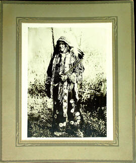Man wearing Indigenous Regalia
