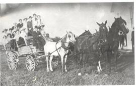 Group of people in a wagon