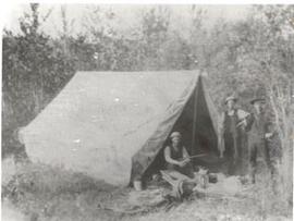 Men by a tent