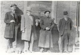 Men standing by the Bank of Hamilton - Melfort, Sask.