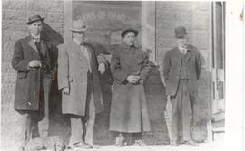 Men in front of The Bank of Hamilton - Melfort, Sask.