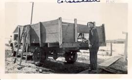 Mr. Corscadden and power truck at Wm. Lobb Farm - Beatty, Sask.