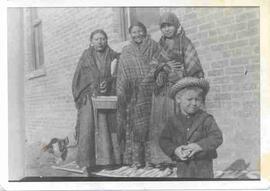 Fred J. Gilmour with three unidentified Native women