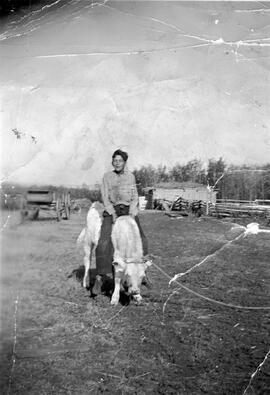 Young David Joseph Lafond and his calf