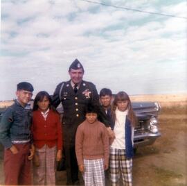 Stanley Lafond in army uniform with nieces and nephews