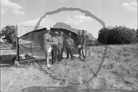 Dr. Ernest G. Walker, William Thomas Molloy and three others in front of excavation tent