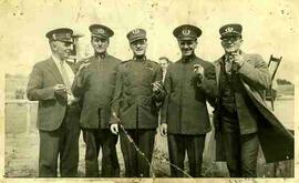Men in uniform smoking