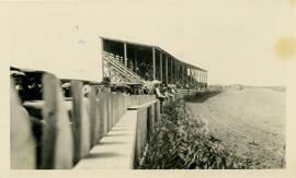 Bleachers and fence at racetrack
