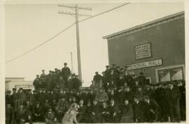 Large group of men in front of Memorial Hall