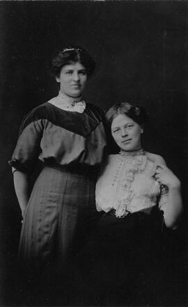 Two young women in early 20th-Century attire