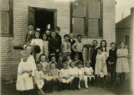 Children posed on steps of Anglia Community Hall