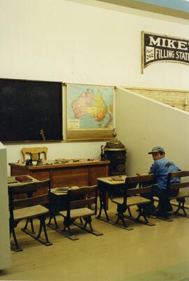 Museum display of an early schoolroom