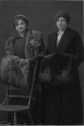 Two young women in winter attire