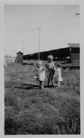 Children playing near the railroad track