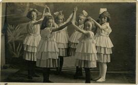 Six young girls in costume