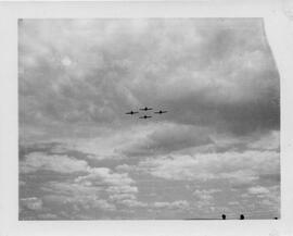 Four airplanes flying in formation