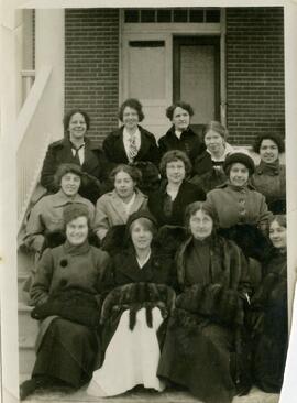 Women seated on steps