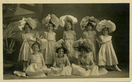 Eight girls in costume