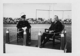 Commanding Officer and Mayor McNab seated
