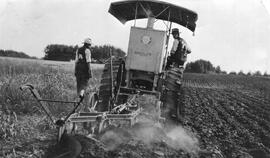 Tractor Plowing a Field