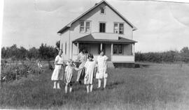 Girls Standing in Front of 1925 House