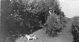 Seager Wheeler and Cat in the Garden