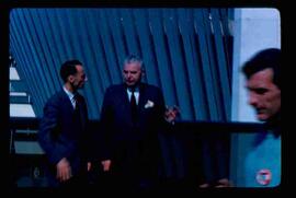 John Diefenbaker talking with man; Expo '67