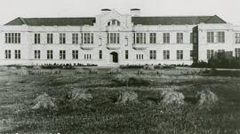 College Building and Stooks