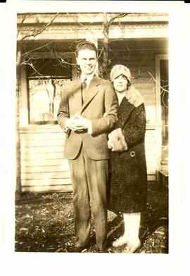 John and Edna Diefenbaker standing outside